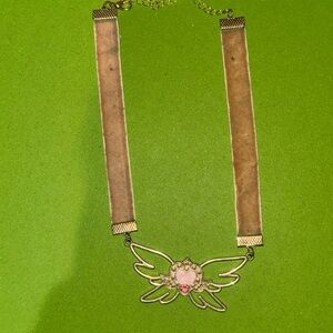 Chic Gold Winged Heart Necklace with Pink Accents